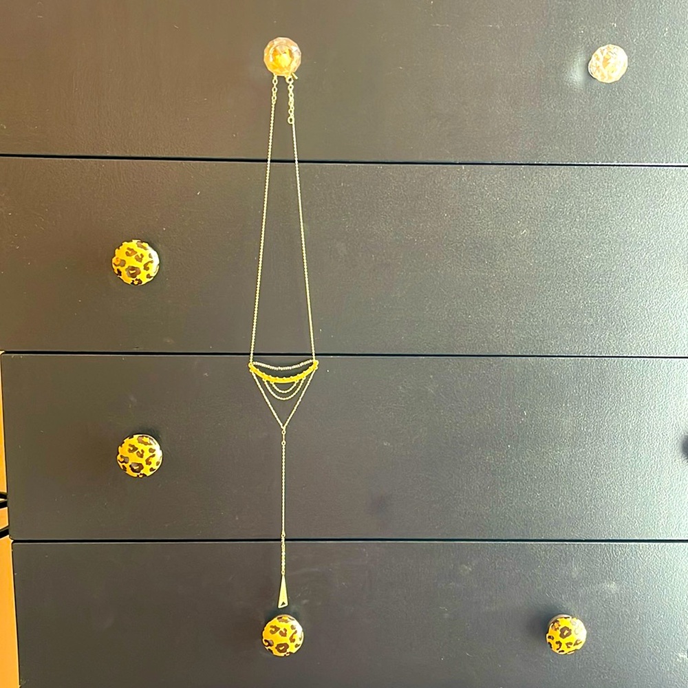Silpada’s K&R long brass necklace